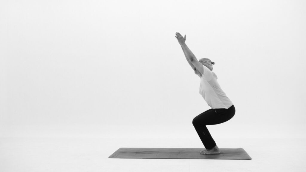 Daily Vinyasa Yoga flow as Active Meditation, Acharya bharat shetty chair pose or Utkatasana