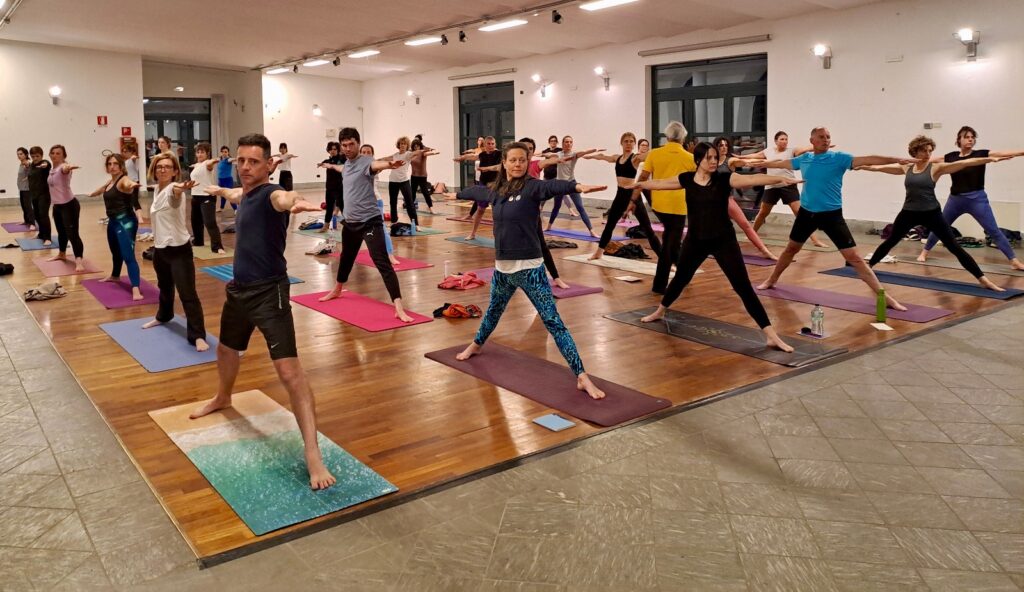 how to avoid injuries in Ashtanga yoga, how to build your practice in a safe method. students performing Yoga Foundation series