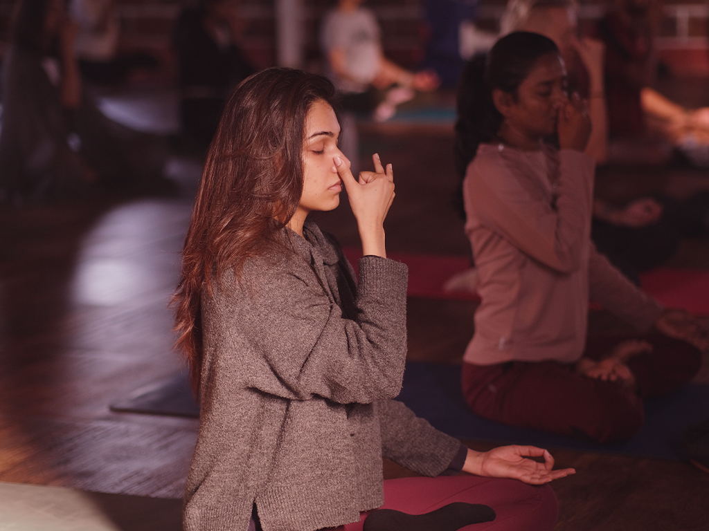 yoga school mornings, students doing pranayama as a part of ashtanga teacher training at bharatha yoga
