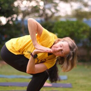 a woman doing yoga in garden